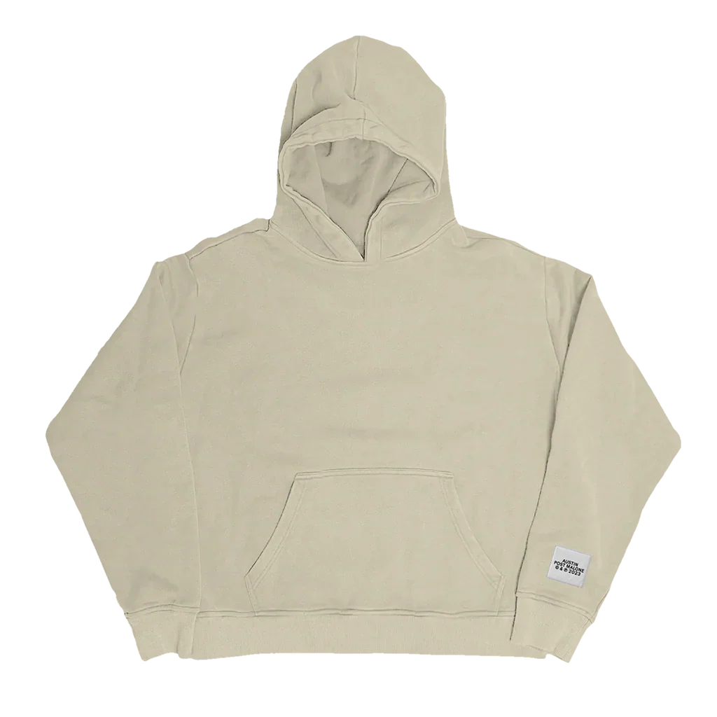 Front view of beige Post Malone Austin streetwear hoodie featuring minimalist oversized fit with neutral-toned premium merch aesthetic