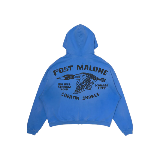 Back view of the blue Post Malone x Cheatin Snakes zip-up hoodie with a flying bird graphic and bold Kansas City tour lettering.