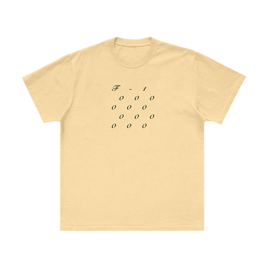 Front view of cream Post Malone merch tee with minimal F-1 Trillion stacked numeric graphic and relaxed fit