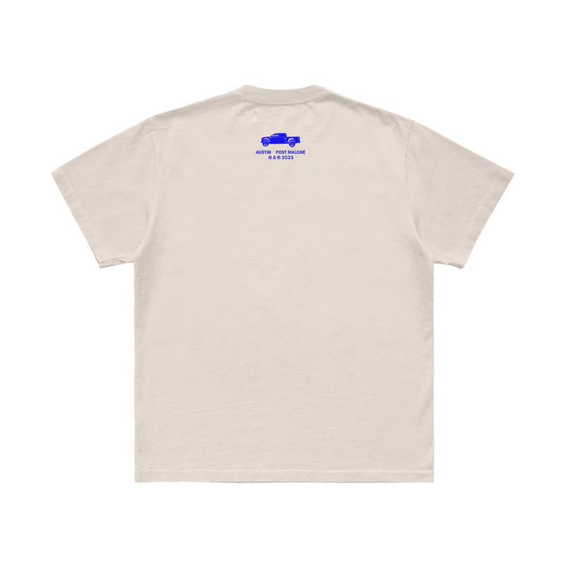 Back view of ivory Post Malone Austin tee with subtle blue logo detail and clean relaxed streetwear aesthetic