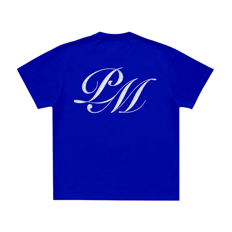 Back view of blue Post Malone F-1 Trillion t-shirt featuring oversized PM monogram graphic and minimalist tour merch aesthetic