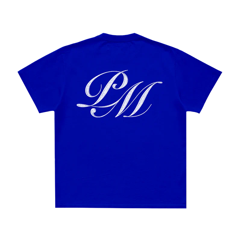 Back view of blue Post Malone F-1 Trillion t-shirt featuring oversized PM monogram graphic and minimalist tour merch aesthetic