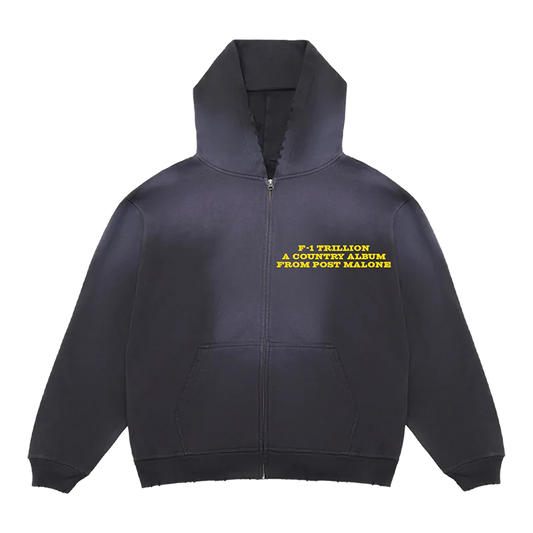 Front view of black Post Malone F-1 Trillion zip up hoodie featuring yellow country album text and minimalist western-inspired streetwear design