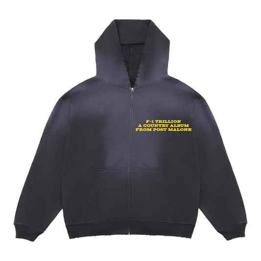 Front view of black Post Malone F-1 Trillion zip up hoodie featuring yellow country album text and minimalist western-inspired streetwear design