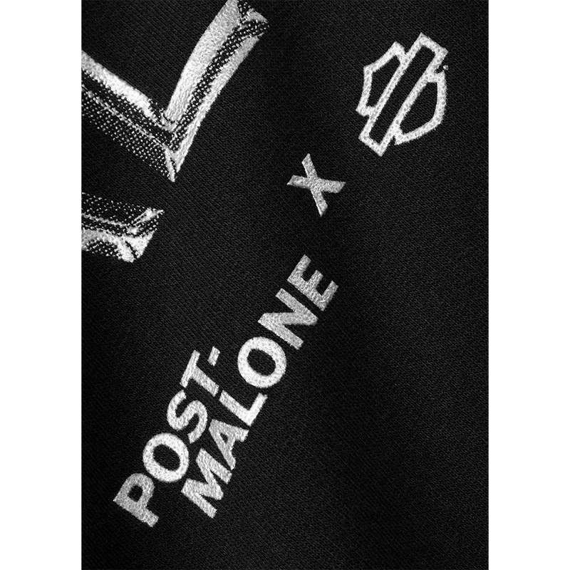 Close-up detail of Chrome Malone metallic graphic with Post Malone x Harley-Davidson collaboration branding on black hoodie