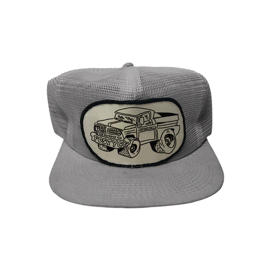 Grey Post Malone merch mesh trucker hat featuring Posty Co truck graphic patch on front breathable streetwear fan apparel