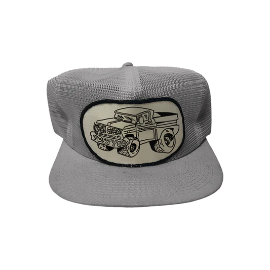 Grey Post Malone merch mesh trucker hat featuring Posty Co truck graphic patch on front breathable streetwear fan apparel