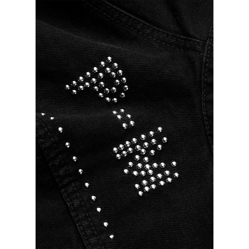 Closeup of black Post Malone merch vest featuring silver stud embellishments and western inspired stitching details.
