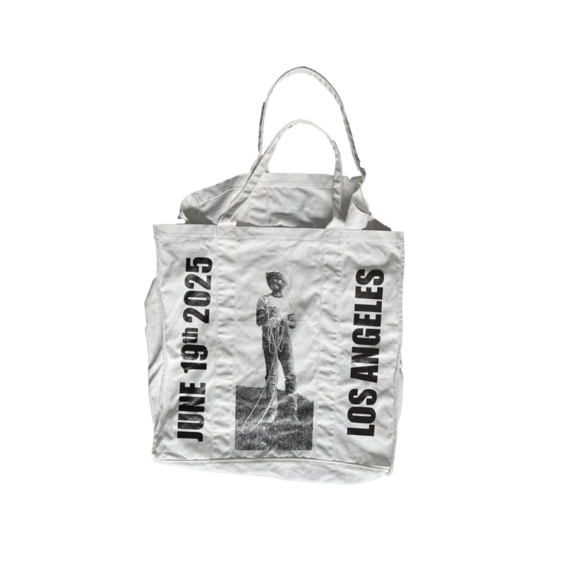 Cream Post Malone merch tote bag with cowboy rope graphic and Los Angeles text design on back official fan apparel