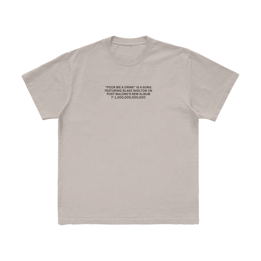 Front view of beige Post Malone Pour Me A Drink graphic tee featuring F-1 Trillion album text and minimalist country-inspired design