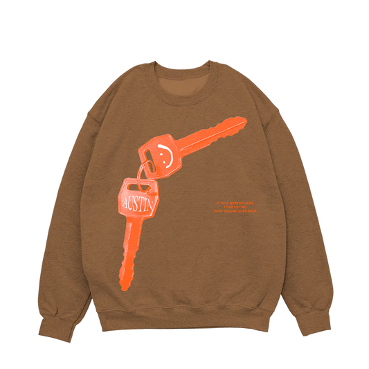 Brown Post Malone crewneck with oversized Austin key graphic and vintage-inspired minimalist streetwear design